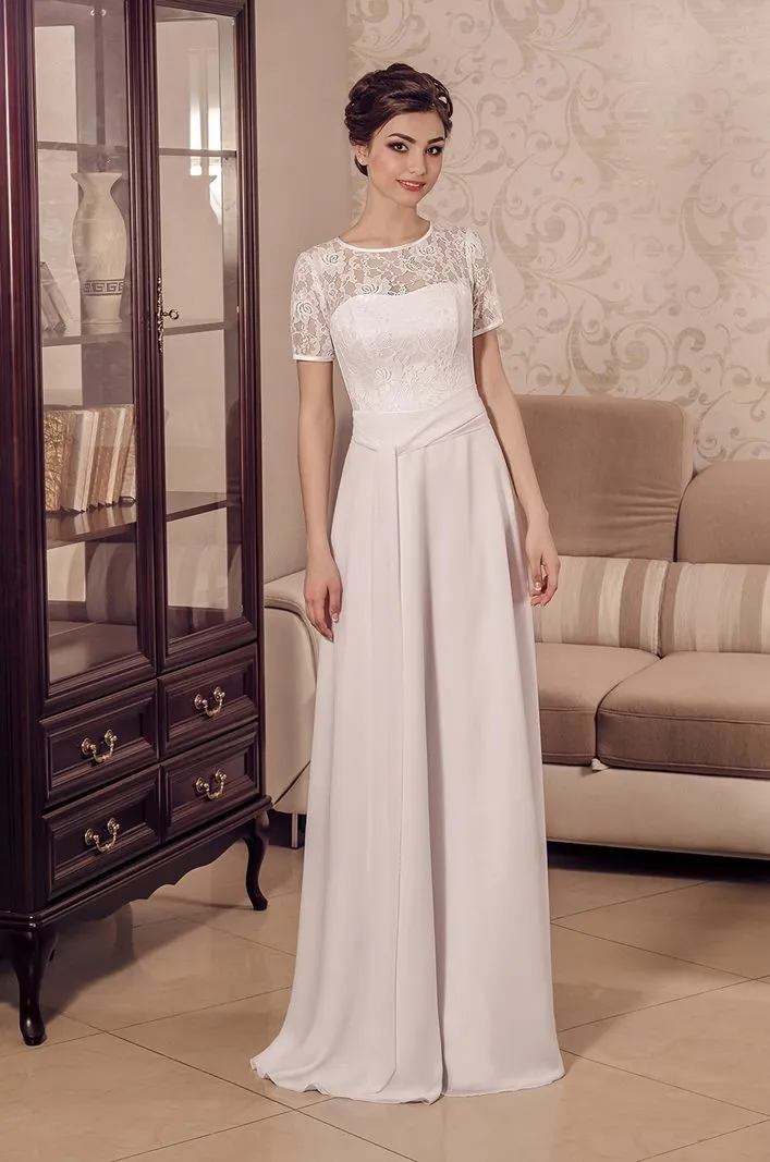 ---Second wedding dress made in lace and chiffon with preformed bustier and short sleeves with transparencies--
