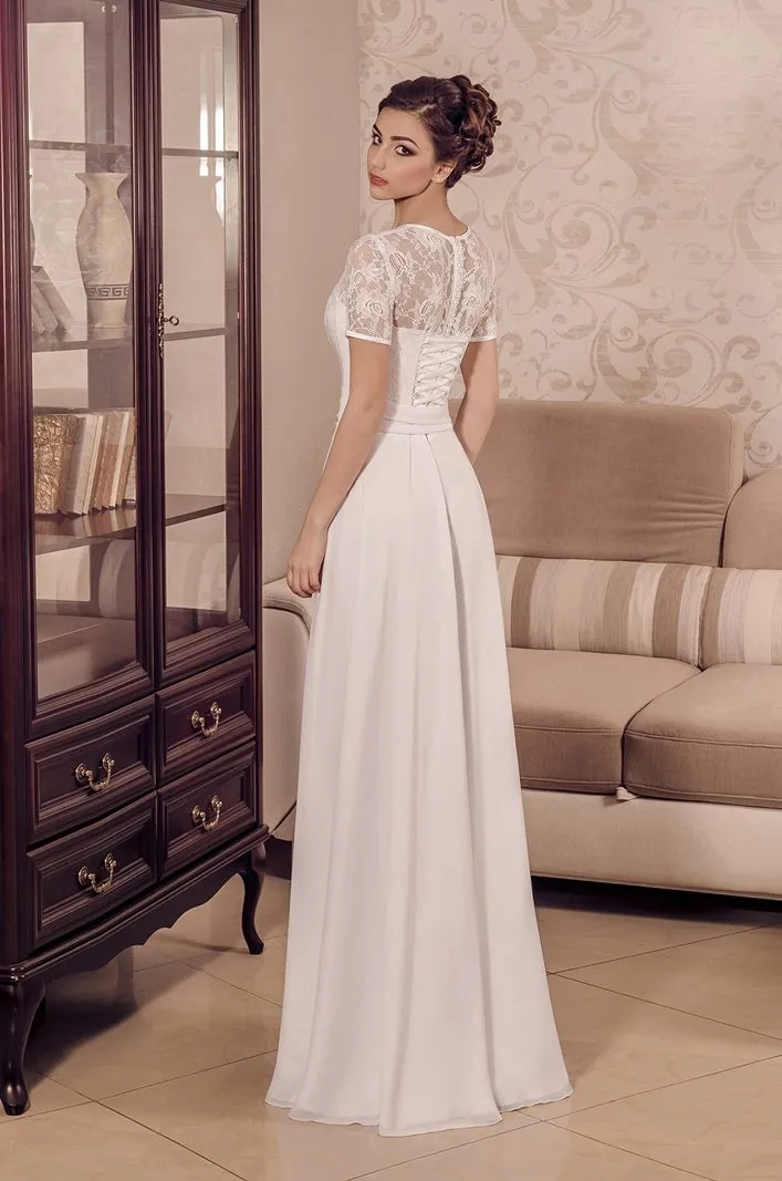 ---Second wedding dress made in lace and chiffon with preformed bustier and short sleeves with transparencies--