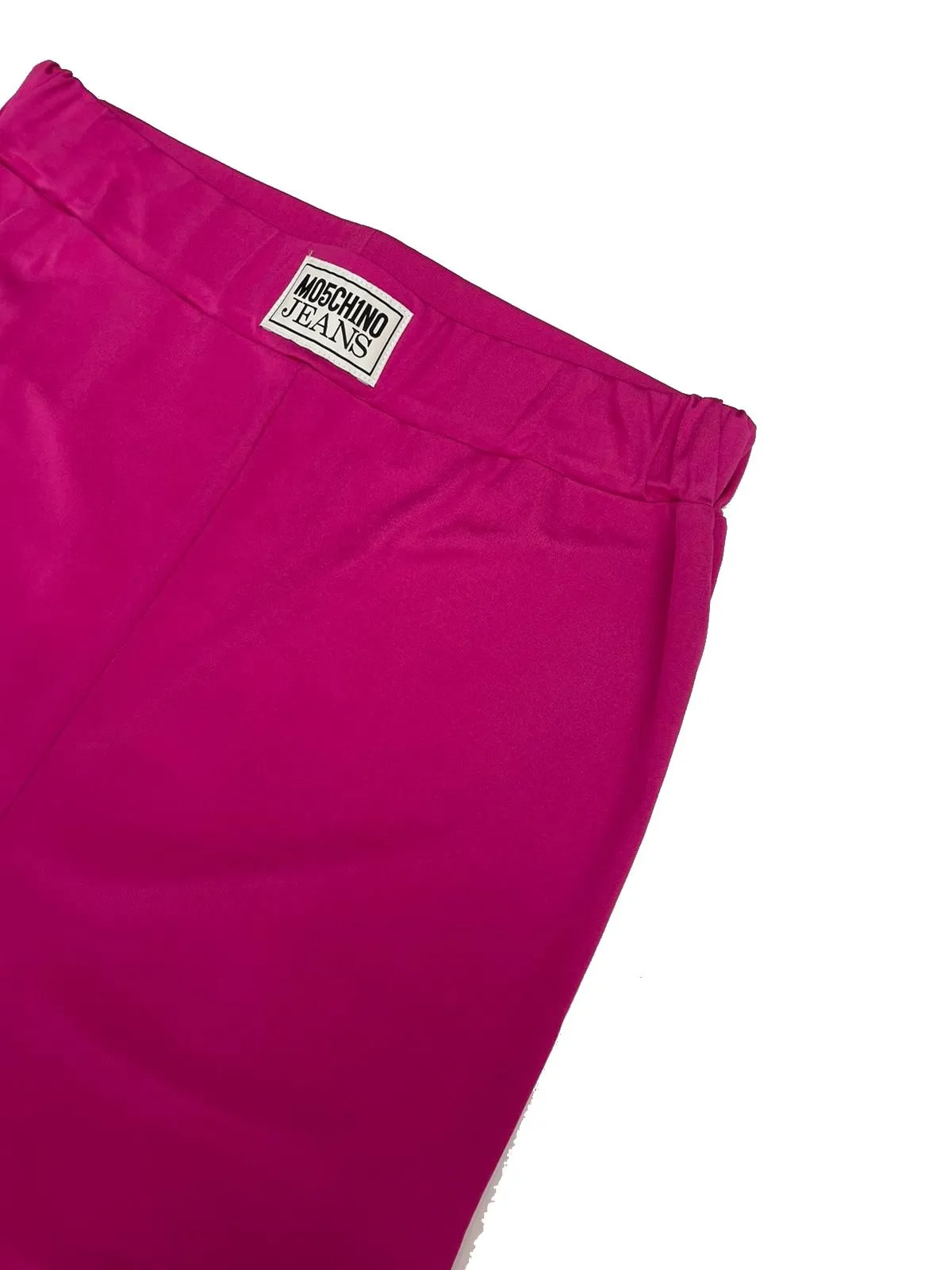 LEGGINGS CORTO FUCSIA CON PATCH LOGO