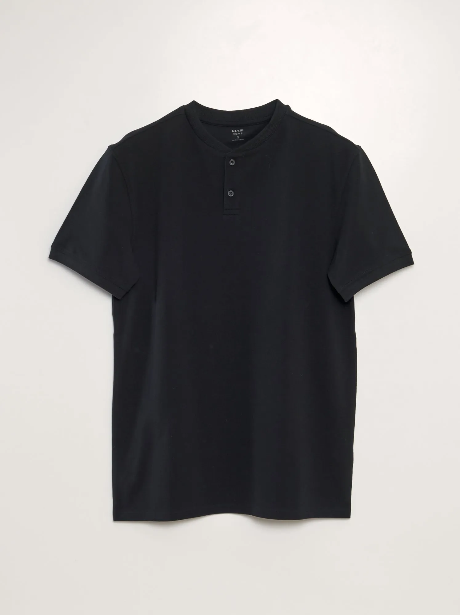 Polo in piqué di cotone tinta unita - nero