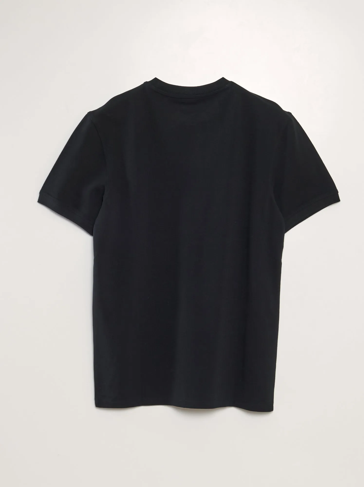 Polo in piqué di cotone tinta unita - nero