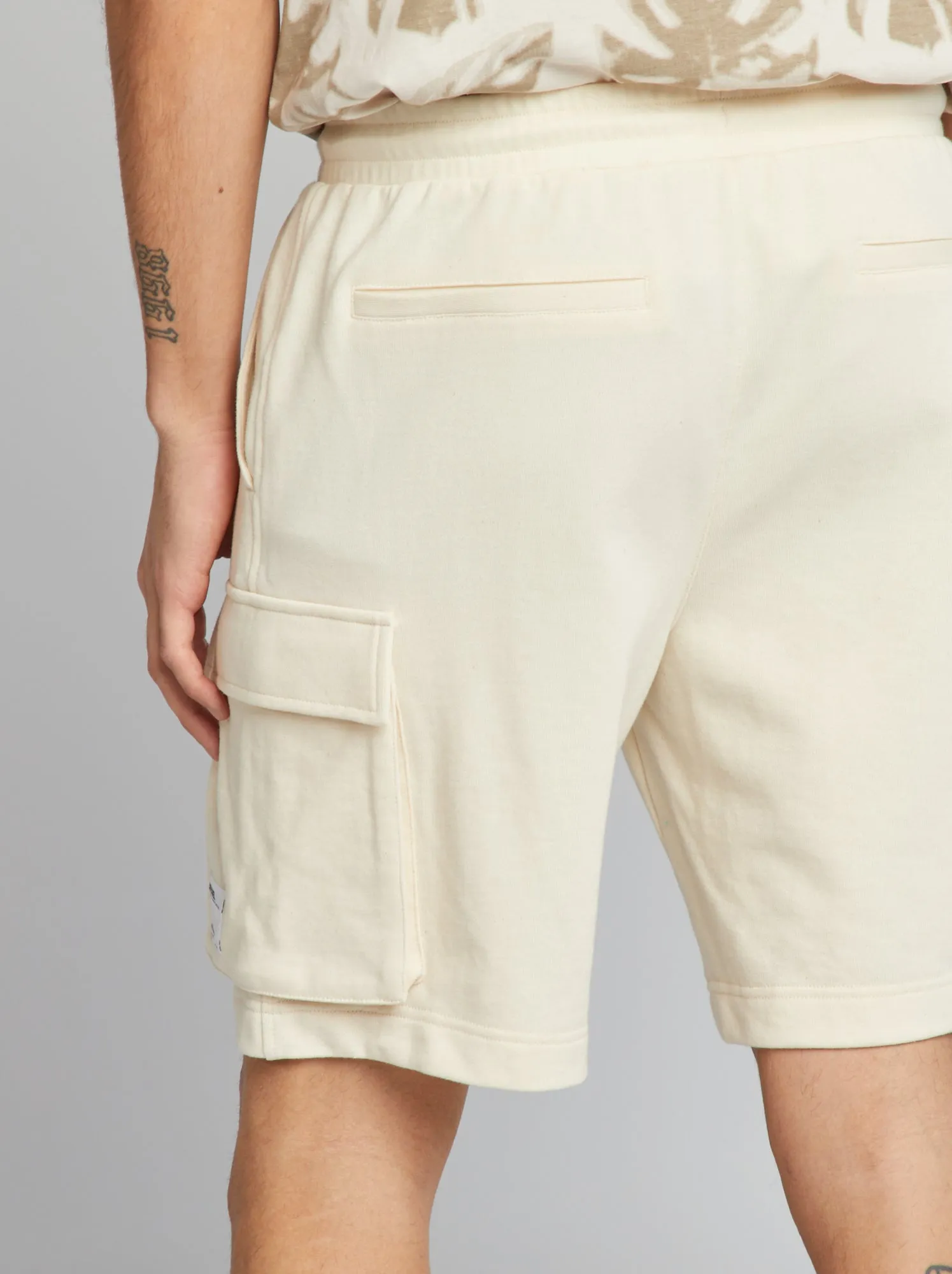 Shorts in tessuto felpato con tasche laterali - BIANCO