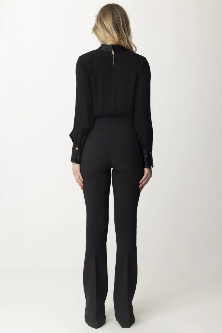 Tuta combinata con accessorio al colletto Nero
